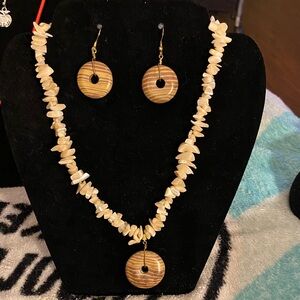 Handcrafted garter teeth shell chips with a wooden donut